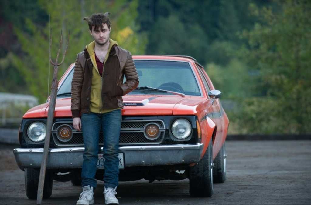 Lg Perrish (Daniel Radcliffe) poses for the camera on set