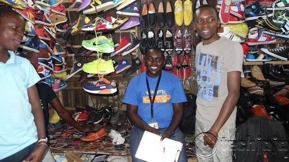 John Baptist Kaymu Delivery Specialist, picking up orders from seller