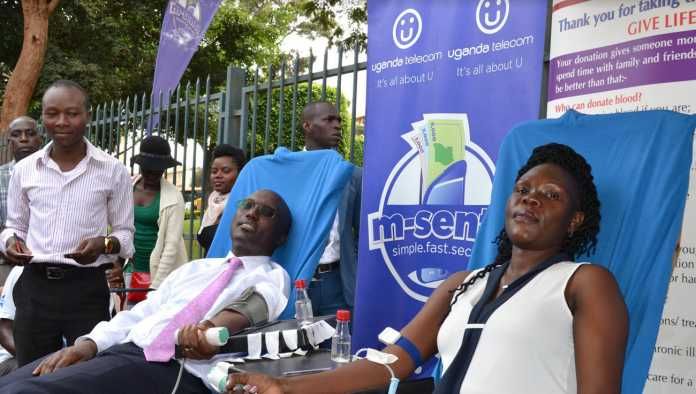UTL blood donation drive Minister Anite Evelyn donates
