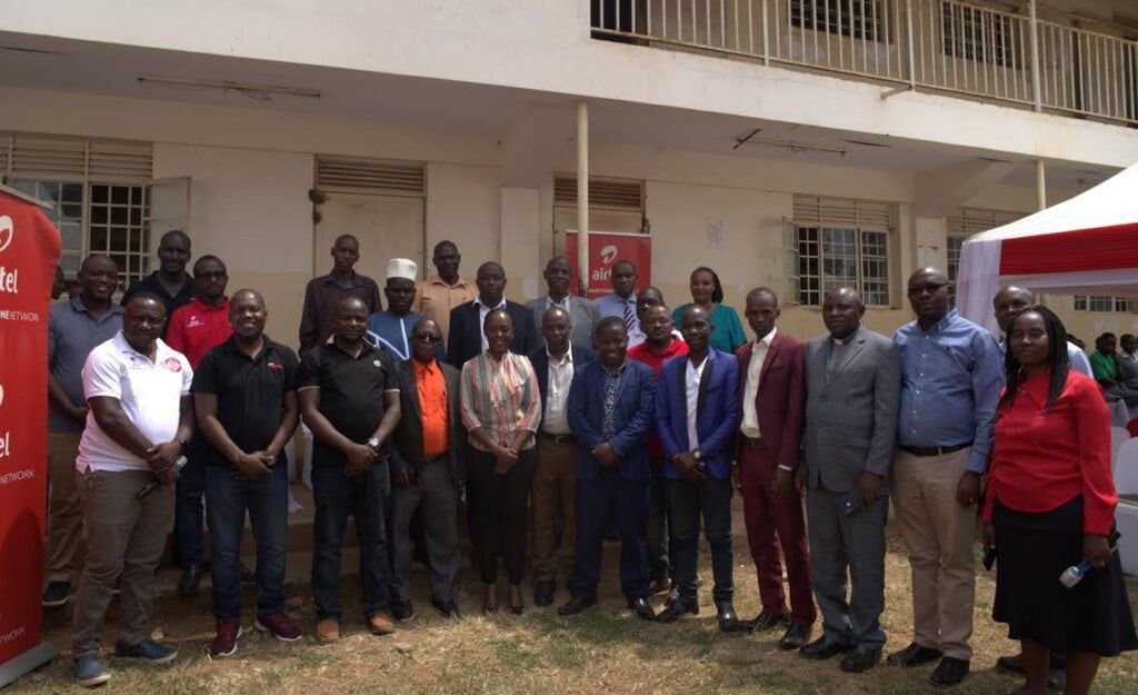 Airtel Uganda staff with some of the Head Teachers of the selected schools